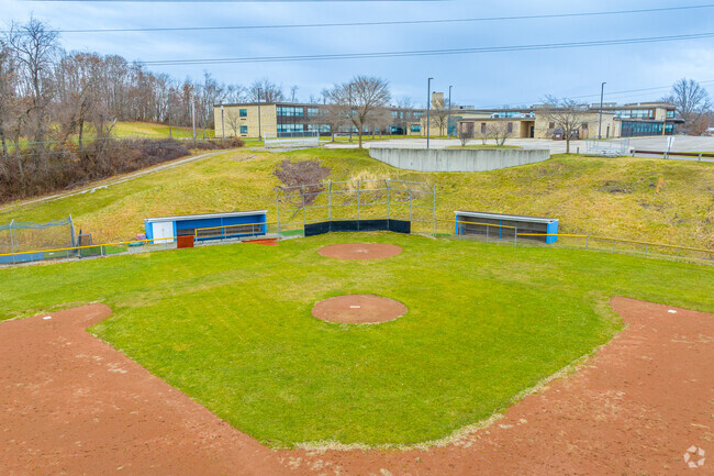 Charles A Huston Middle School includes a well kept baseball field for students.