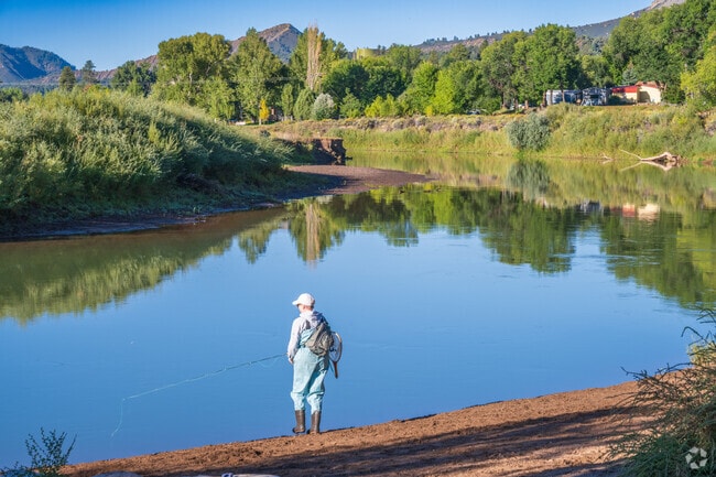 A local enjoys fishing at a calm and quiet spot found along the Animas River.