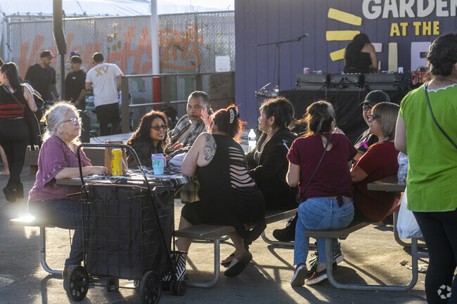 A family having fun at the Berryessa Night Market.