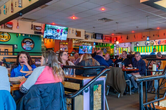 Grab a meal or a drink and enjoy the game at Mid Town Pub near Orchid Heights.