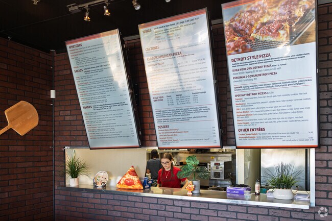 Grab a hot, delicious pie from Twin Peaks Pizzeria near Continental Ranch Sunflower.