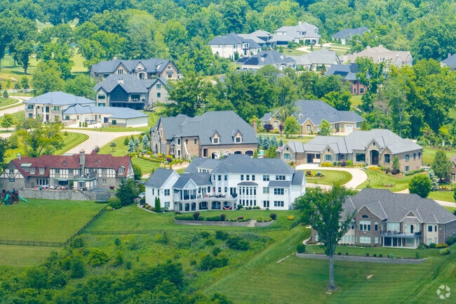 Custom-build mansions along the Ohio River are among Coldstream's housing options.