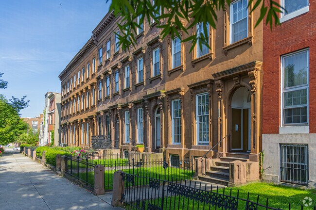 If you are looking for affordable housing, there are some nicer row homes on W Fayette St.
