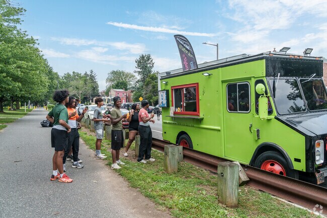 A food truck serves cold treats on a hot summer day along Cobbs Creek Parkway near Millbourne.