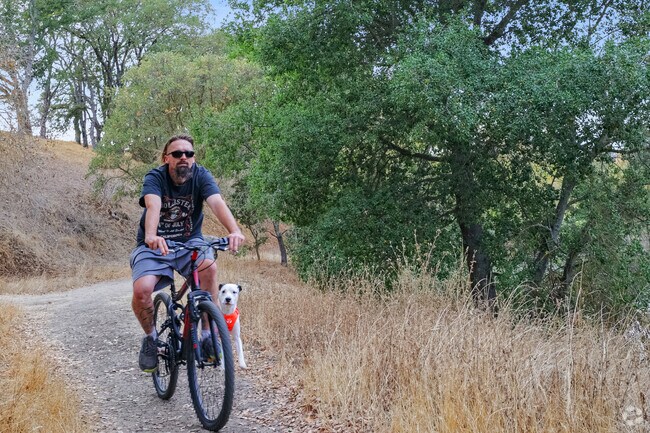 Pacheco neighborhood presidents have fun riding their bicycles at Hawk Hill Trail