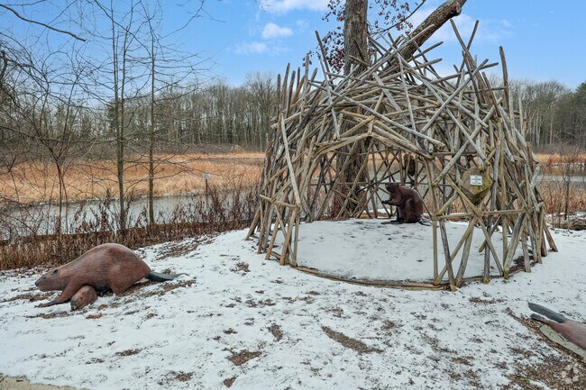 Educational exhibits like the model beaver at North Chagrin Reservation promote awareness of native species and ecosystems.