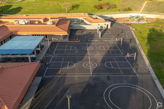 The playground offers basketball among other outdoor activities at Clarence Lobo Elementary.