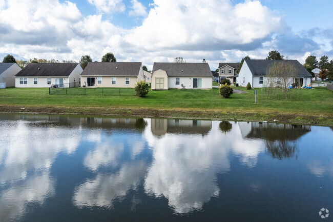 Some homes in West Newton have small ponds in their back yards.