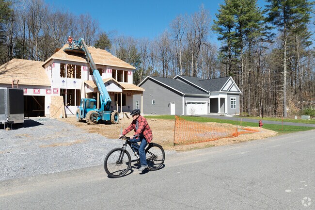 Construction crews and bikers frequently navigate the changing streetscapes in Malta.