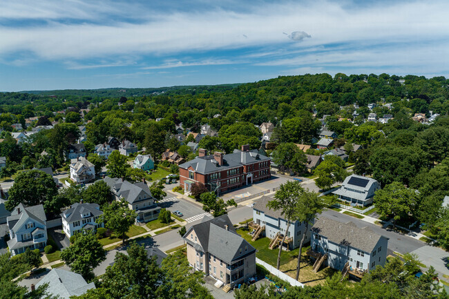 The Midland Street School is surrounded by Worcester's dense greenery.