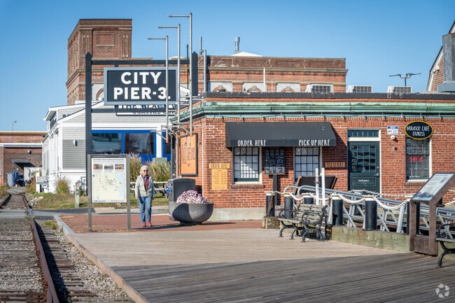 Relax and unwind by the bay at New Bedford's scenic Pier 3 close to North Fairhaven.