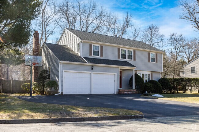 Some split level homes with large two car garages can be found in Wellesley Hills.