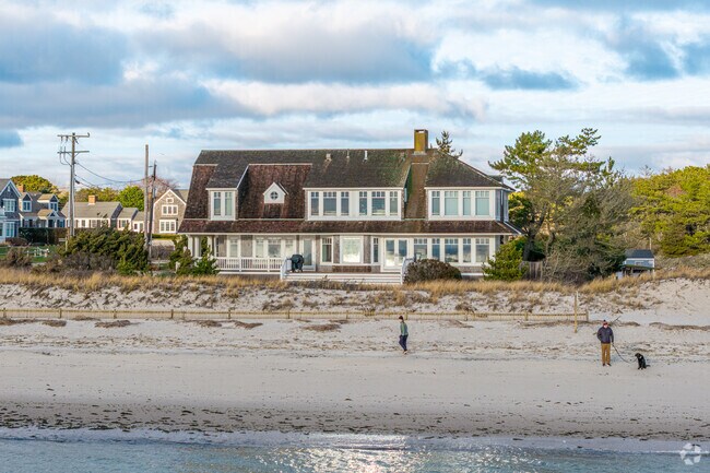 Waterfront homes range from modest Cape Cods to larger custom builds.