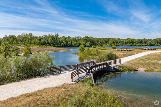 Prairie Oaks Metro Park features scenic walking trails winding through woods, lakes, and open meadows.