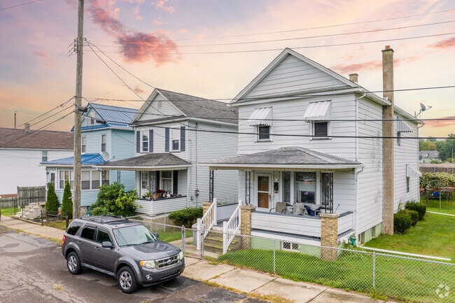 Foursquare row homes line the residential streets of Plymouth.