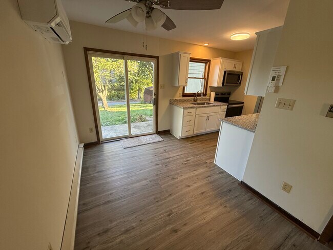 Kitchen walks out to lovely porch and yard