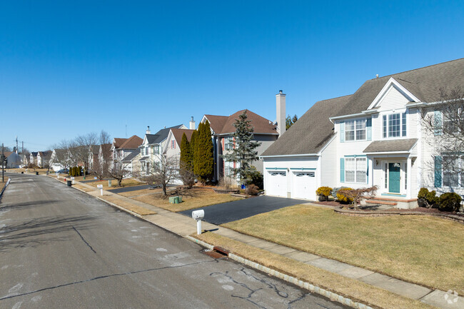 Newer home developments featuring colonial homes with driveways and garages are common in Monmouth Junction.