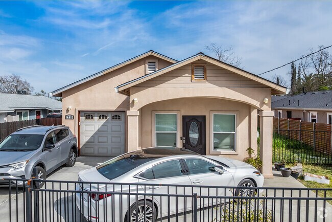 This updated home has a Spanish revival style to it in Ben Ali.