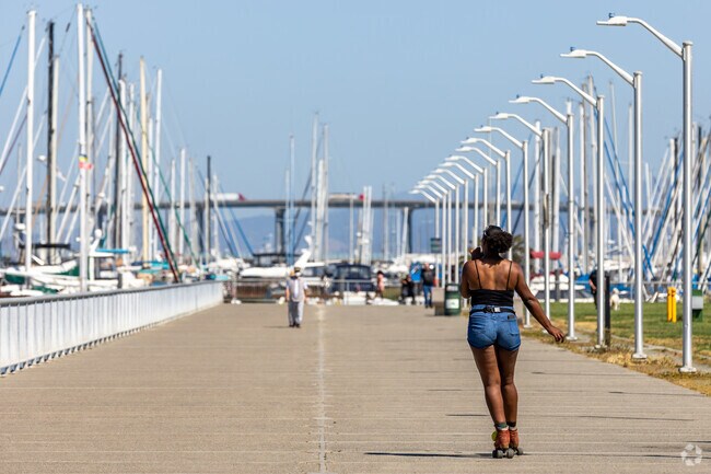 Residents walk and roller-skate along the paths in the West Vallejo neighborhood.