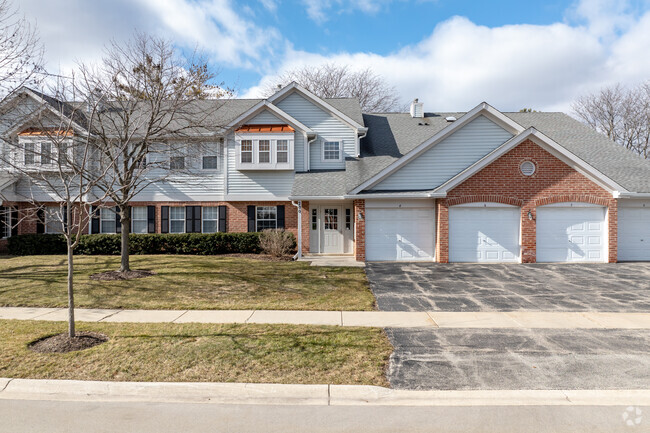 Town homes are very common in the neighborhood and often surround large public parks.