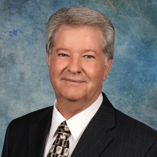 E Neal Mullins