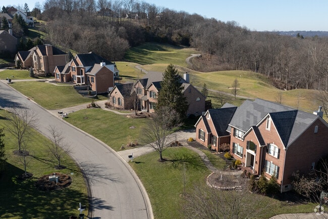 This quality row of homes can be found along Newtown's Ivy Hill Golf Course.