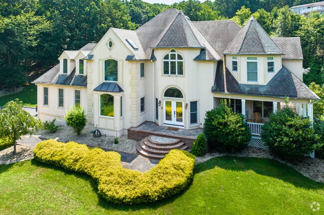 Here is another beautiful mansion, just seconds from McAllister Park in Belle Terre.