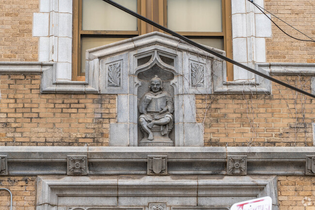 P.S. 23 is a short walk away from Journal Square, a bus and train terminal.