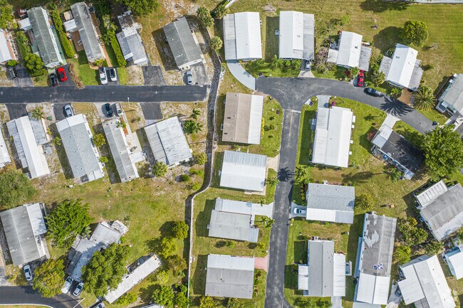Sunset paints the sky over Boynton Bay, creating a picturesque scene.