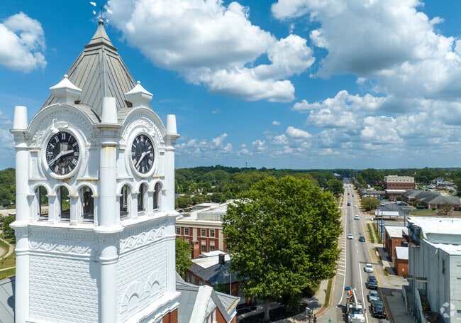 A historic clock on McDonough's courthouse towers over the downtown area.