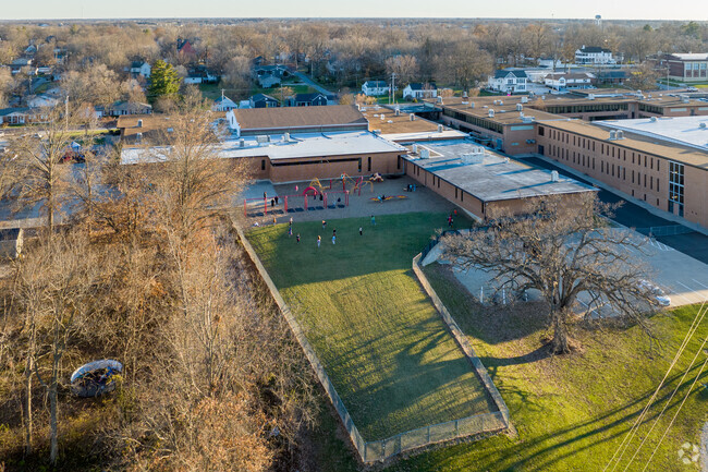 Claude Brown Elementary School's large playground is located around back.