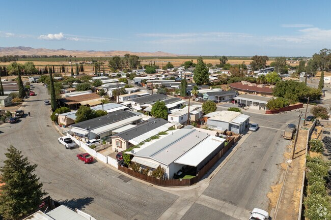 Homes blend with hillsides on the edge of Santa Nella.