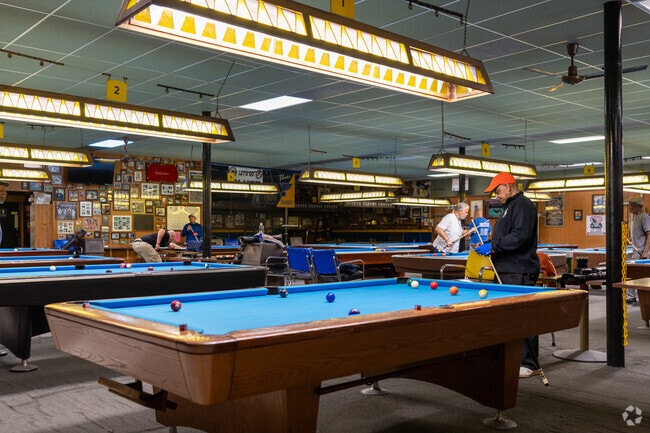 Check out the pool leagues at Cue & Cushion near Woodson Terrace.