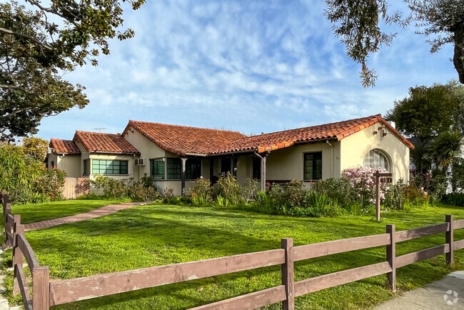 Some homes in Luna Park have large fenced-in front yards.