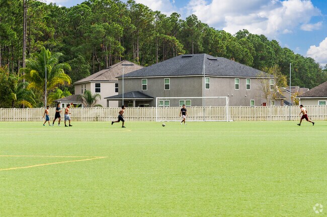 Experience the lively spirit of Mandarin Station as residents unite for friendly matches.