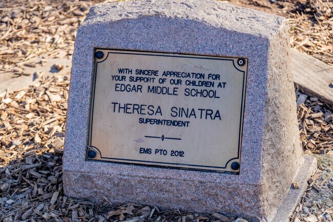 A dedication is placed in the back of Edgar Middle School.