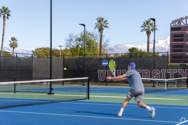 Students practice their tennis game at University of Redlands in North Redlands.