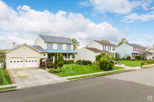 Rows of Modern Colonial homes line the streets of Hutchinson Mills.