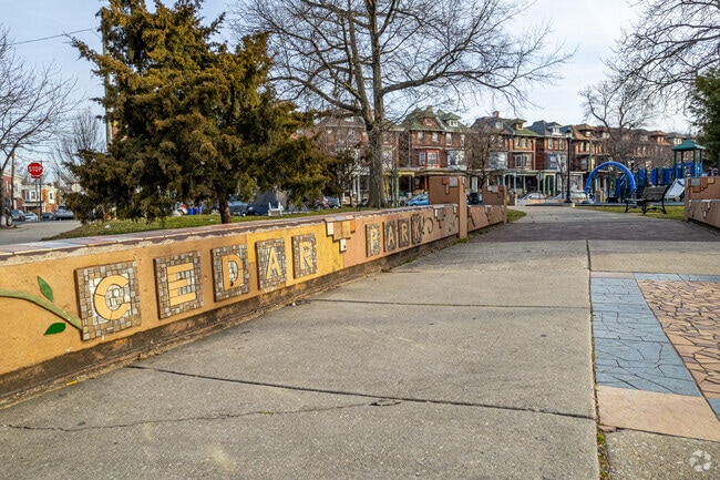 A mosaic sign welcomes visitors to Cedar Park.