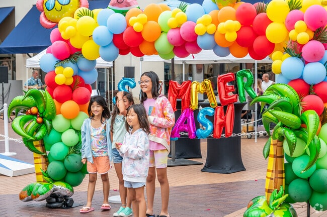 Southwest San Clemente families are all  smiles at the annual Summer Splash event featuring live music and kids activities.