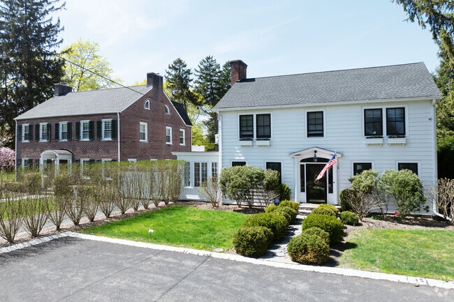 Well-maintained lawns and colonial homes line Albany Ave. in Kingston Township.