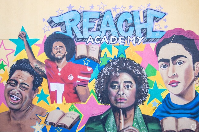 A mural project showcasing inspiring figures was completed by Reach Academy Staff in Las Palmas.