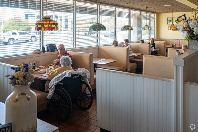 Patrons of Pancake Cafe enjoy their oven-baked omelettes and pancakes in Naperville, IL.