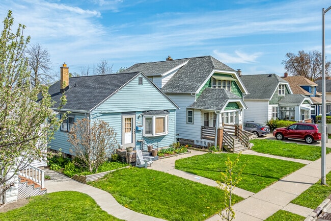 A row of quaint, unique homes lines a block in Woodlawn Manor, West Allis.