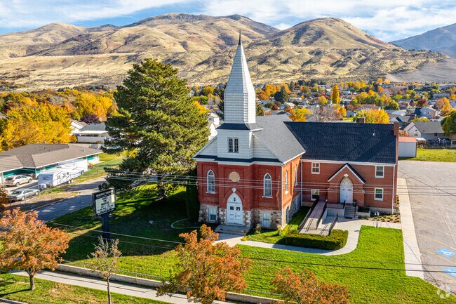 The Heritage Theatre stands proudly against Perry’s Wasatch Mountain backdrop.