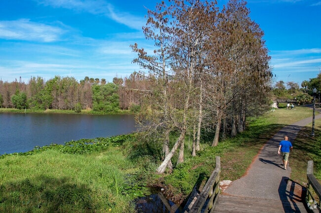 Enjoy a walk along the walking path in Booker Creek Park.