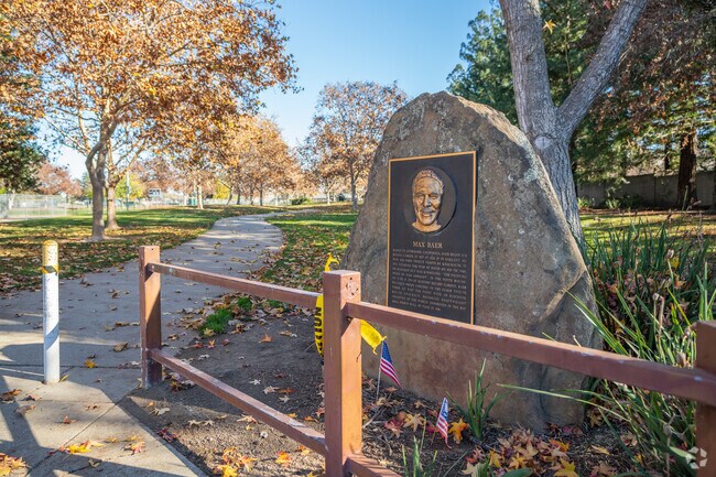 Max Baer Park nearby Carlton Square has multiple baseball fields for playing baseball.