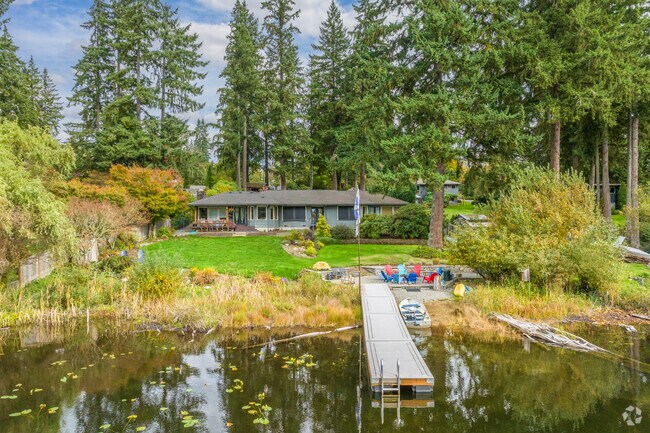 Find your slice of paradise in a waterfront ranch-style home in High Bridge.