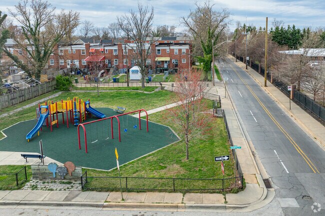 The colorful playground at Pimlico Good Neighbor Park gives children a safe area to have fun.