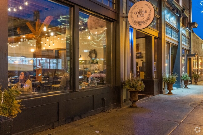 People eating dinner at the Copper Hen restaurant.